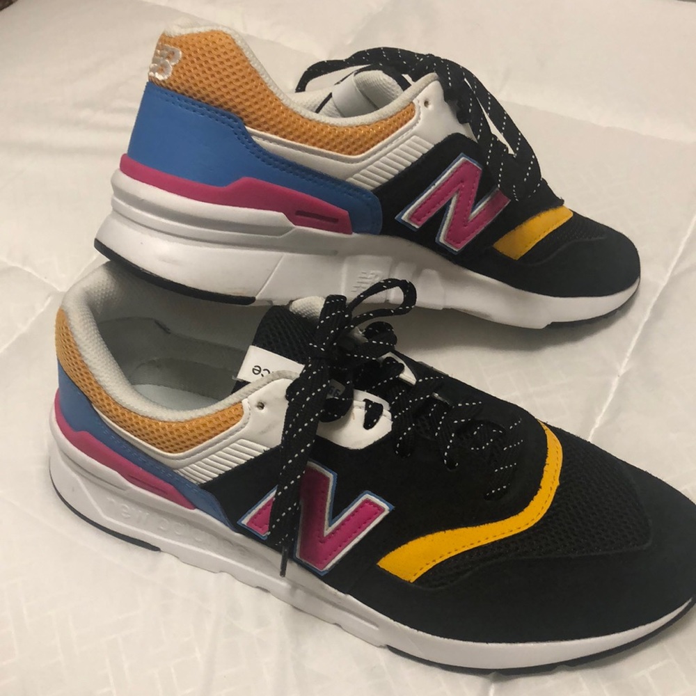 Mens size 10 black new balance sneakers with multi colored accents
